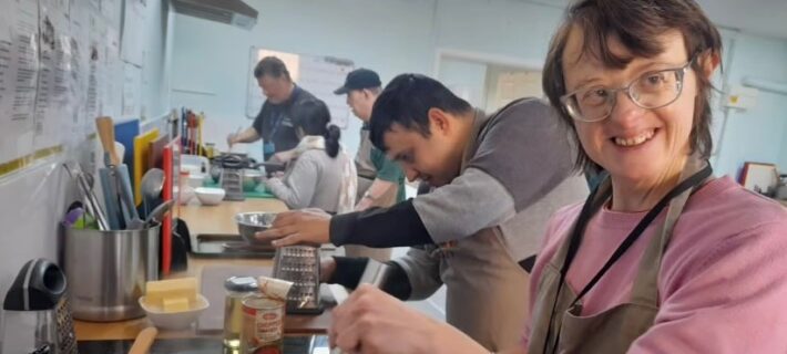 People enjoying a cooking lesson